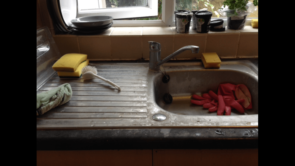 kitchen sink before cleaning